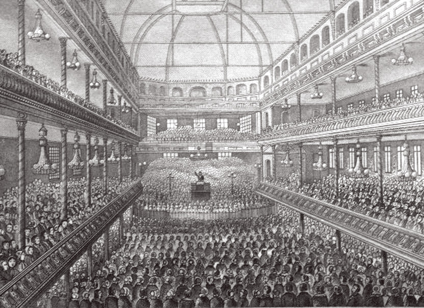 1858年左右，司布真在薩里音樂廳（Surrey Music Hall）講道情景。（來源維基）