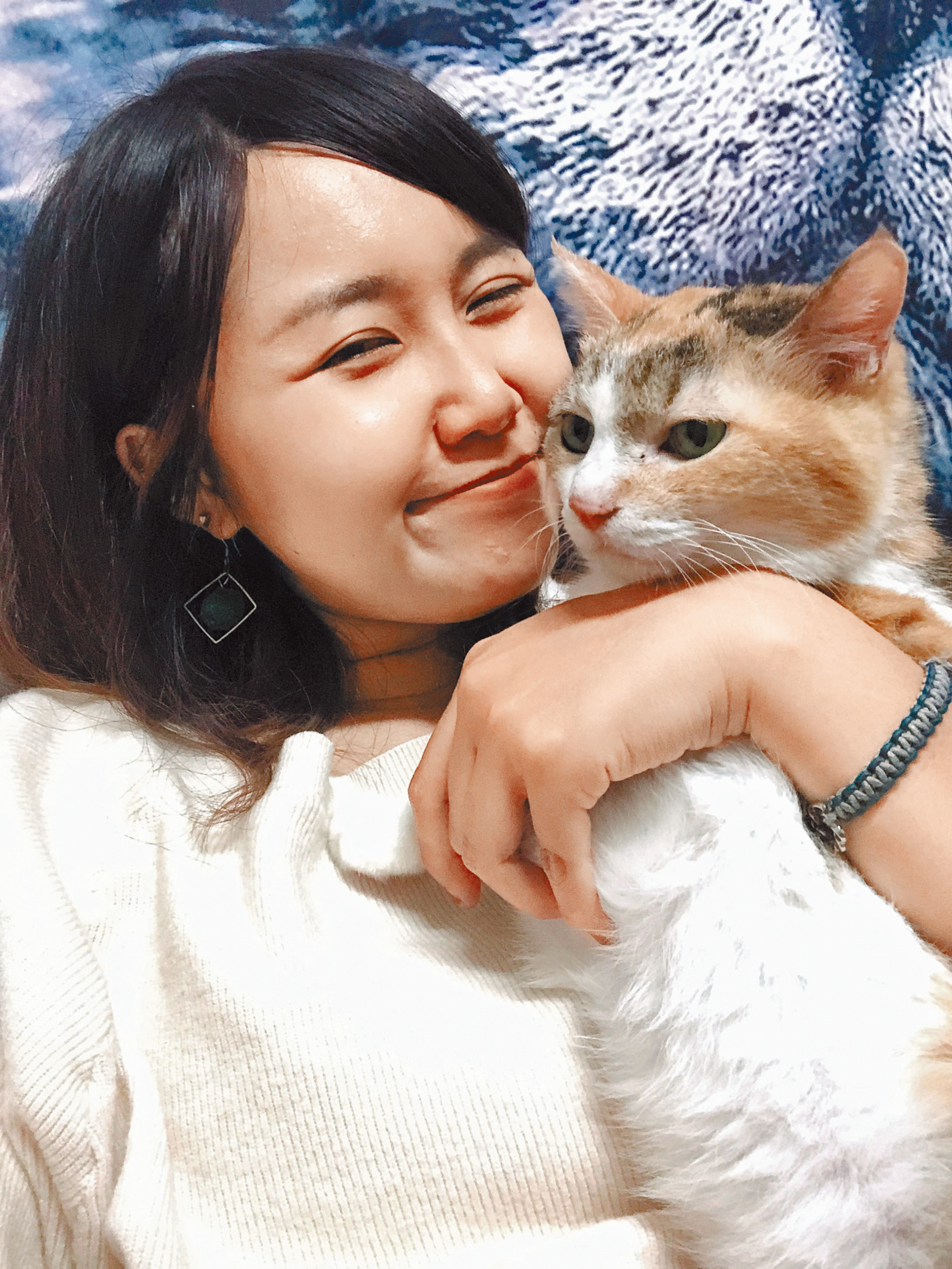 薛家錥與愛貓。（圖／受訪者提供）